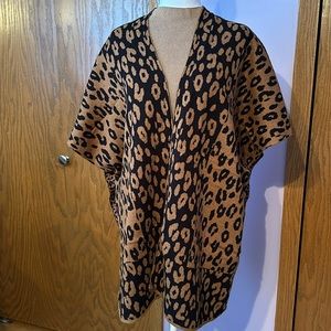 Chico’s small/medium leopard sweater wrap with matching pouch.